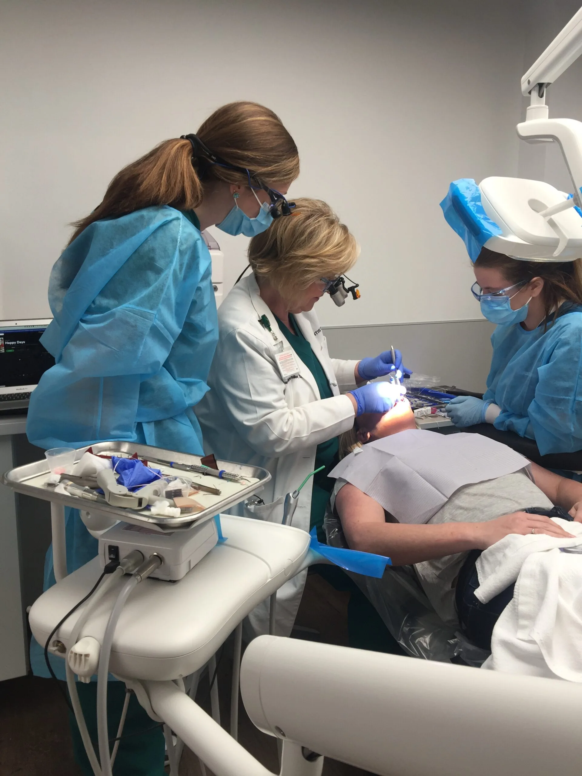 decatur al general dentist dr teichmiller giving a patient exam
